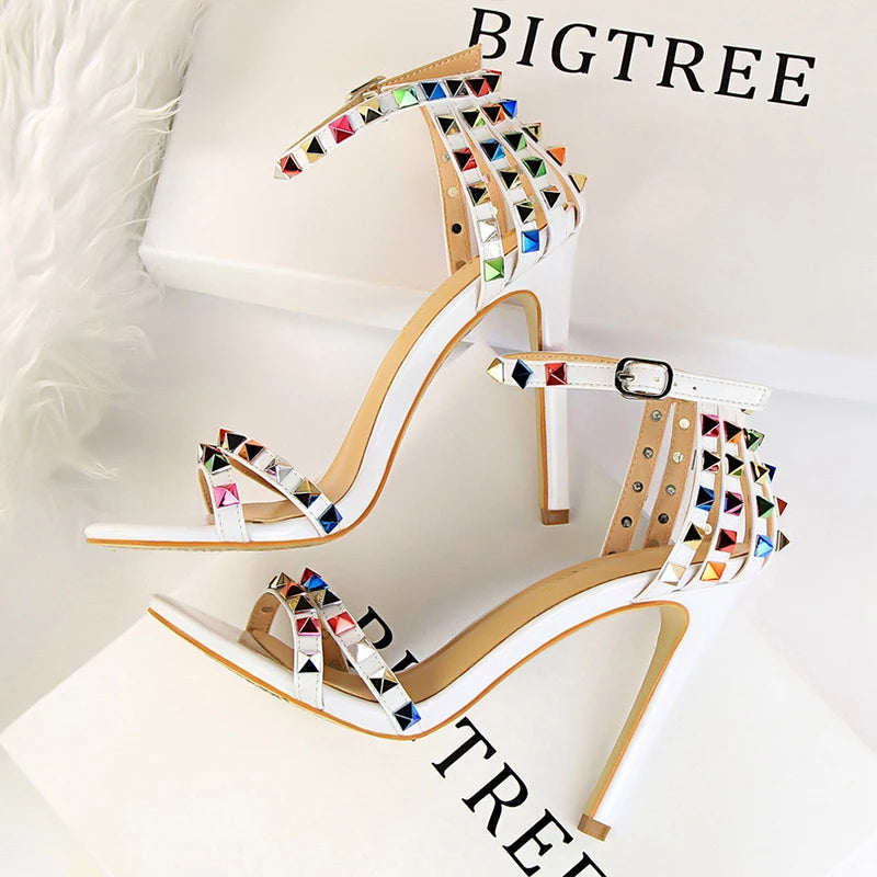 Women's Roman Style Hollow Cut Out Heeled Sandals with Colored Rivets
