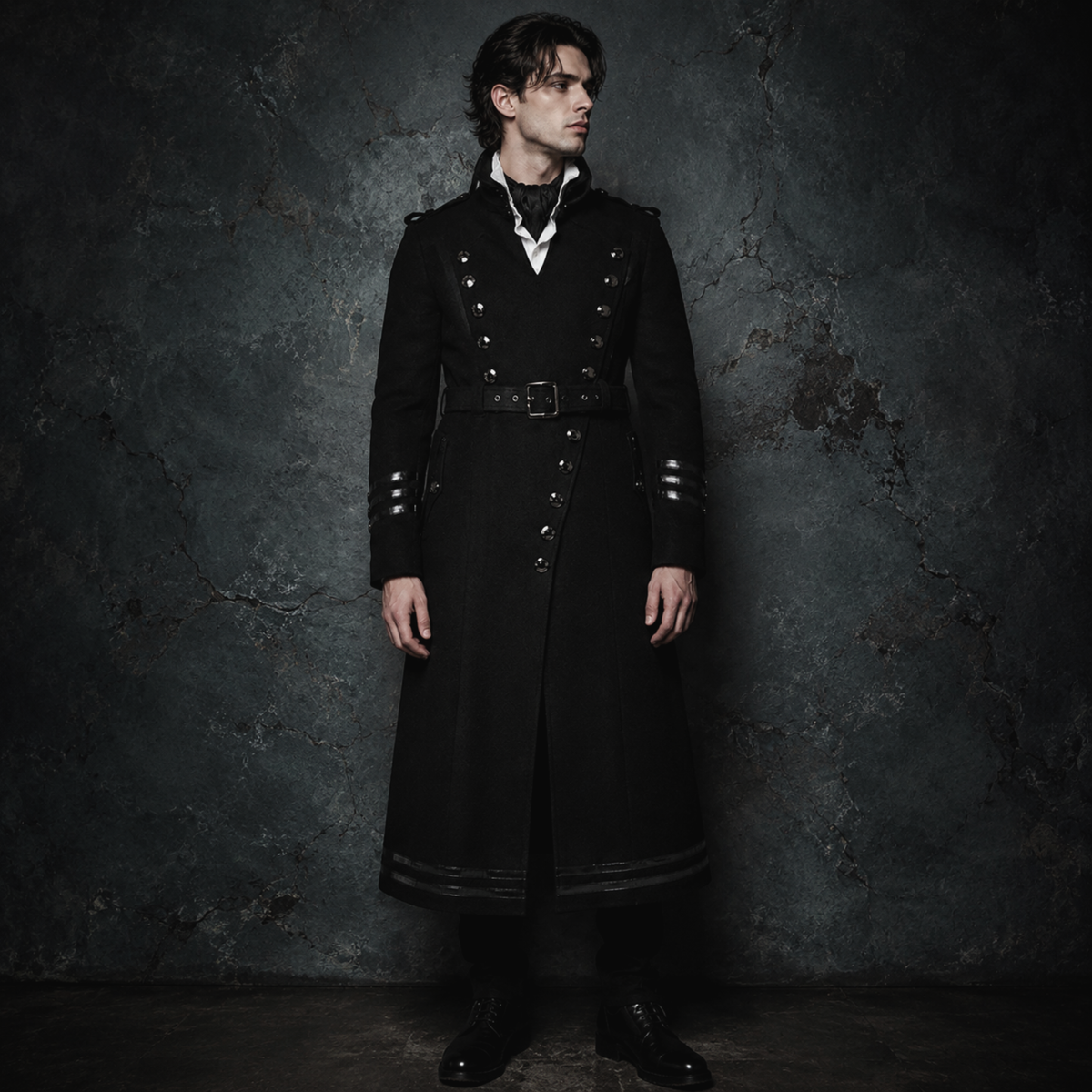 Man wearing black gothic military long coat with double breasted metal buttons and structured high collar