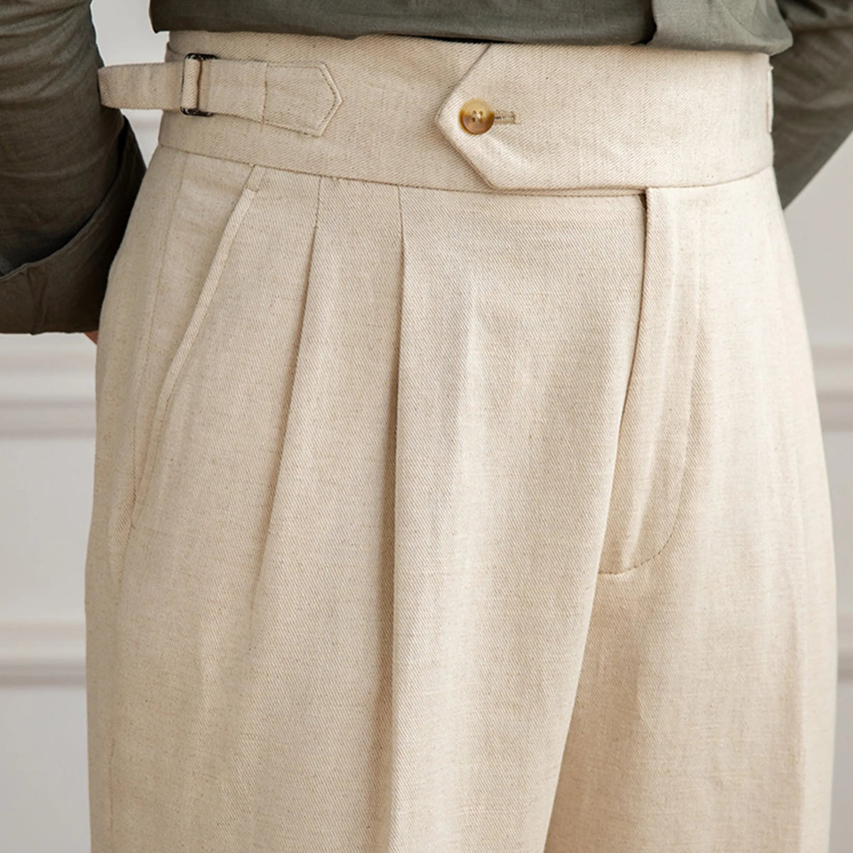 men's linen trousers, linen cotton trousers, pleated trousers, double pleated trousers, men's tapered trousers, tailored trousers, vintage trousers, vintage menswear, men's tailored pants, linen pants men, cotton linen pants, pleated pants men, tapered pants men, classic trousers, heritage menswear, romantic menswear, old world clothing, vintage inspired clothing, neutral trousers, beige trousers, cream trousers, men's dress trousers, smart casual trousers, extended waistband trousers, cuffed trousers