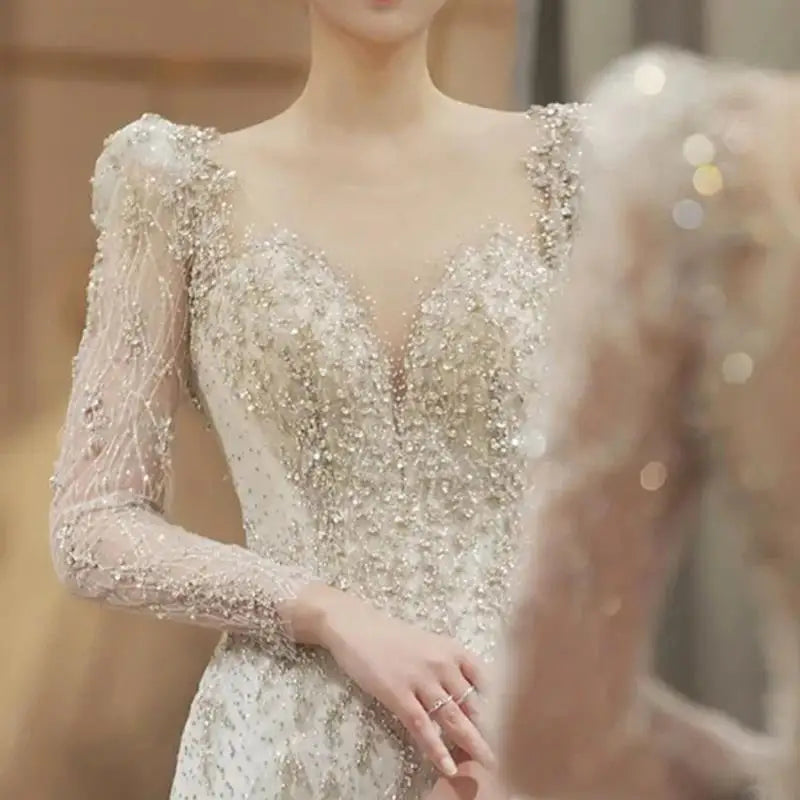 White Long Sleeve V-Back Lace Wedding Dress With Beaded Details & Sheer Overlay - Lovez Aqua© - 