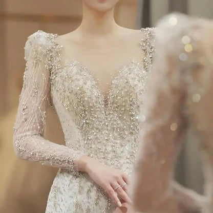 White Long Sleeve V-Back Lace Wedding Dress With Beaded Details & Sheer Overlay - Lovez Aqua© - 