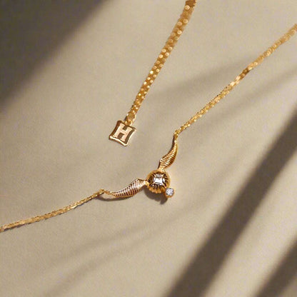Harry Potter Quidditch Golden Snitch Women's Necklace with Hogwarts Emblem - Harry Potter - 