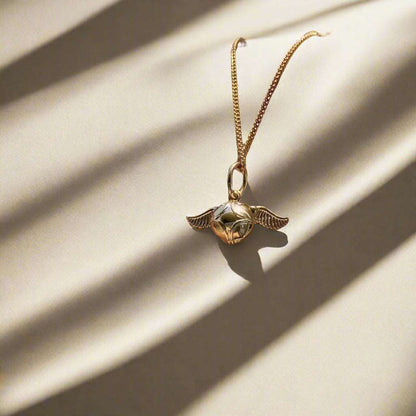 Harry Potter Quidditch Golden Snitch Women's Necklace with Hogwarts Emblem - Harry Potter - 