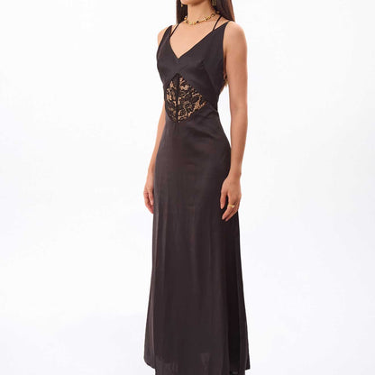 black maxi dress, black lace maxi dress, lace panel dress, bow detail dress, black slip dress, maxi slip dress, women’s evening dress, black evening dress, asymmetric dress, asymmetric bow dress, lace bodice dress, floral lace dress, black party dress, romantic black dress, gothic evening dress, dark romantic dress, lingerie inspired dress, fitted maxi dress, strappy maxi dress, formal black dress, occasion dress, women’s formal dress, statement black dress, elegant black maxi dress, evening maxi dress