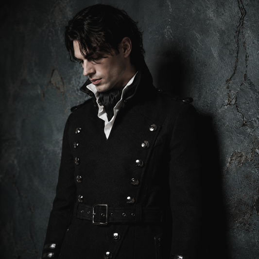 Man wearing black gothic military long coat with double breasted metal buttons and structured high collar