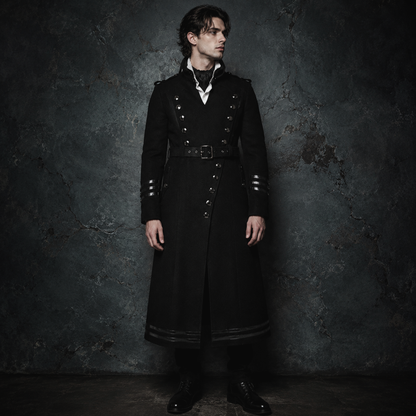 Man wearing black gothic military long coat with double breasted metal buttons and structured high collar