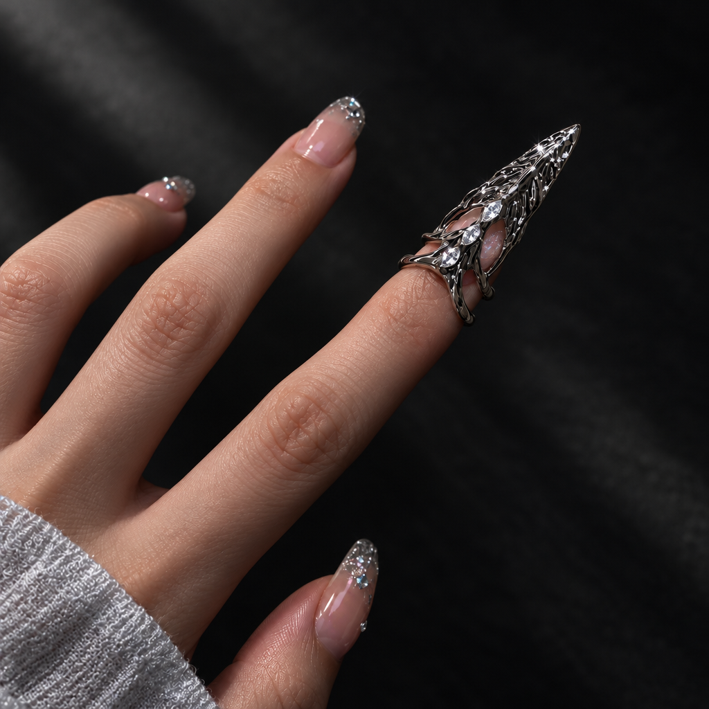 gothic claw ring, finger armor jewelry, silver nail ring, nail armor ring, punk hand jewelry, gothic fingertip ring, unisex gothic jewelry, dark avant garde jewelry, silver claw jewelry, alternative fashion ring, skeletal jewelry, rhinestone claw ring, Y2K gothic accessory, K-pop inspired jewelry, idol stage accessory, metal nail cover, gothic hand armor, cyber gothic accessory