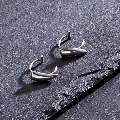 vampire fang lip ring, non piercing lip ring, fake snake bites, gothic lip cuff, fake lip piercing, vampire lip jewelry, black lip ring, silver lip ring, stainless steel lip cuff, gothic body jewelry, non piercing labret, snake bite lip jewelry, vampire accessories, Halloween lip jewelry, alternative fashion jewelry, punk lip cuff, fake fang piercing, gothic makeup accessory
