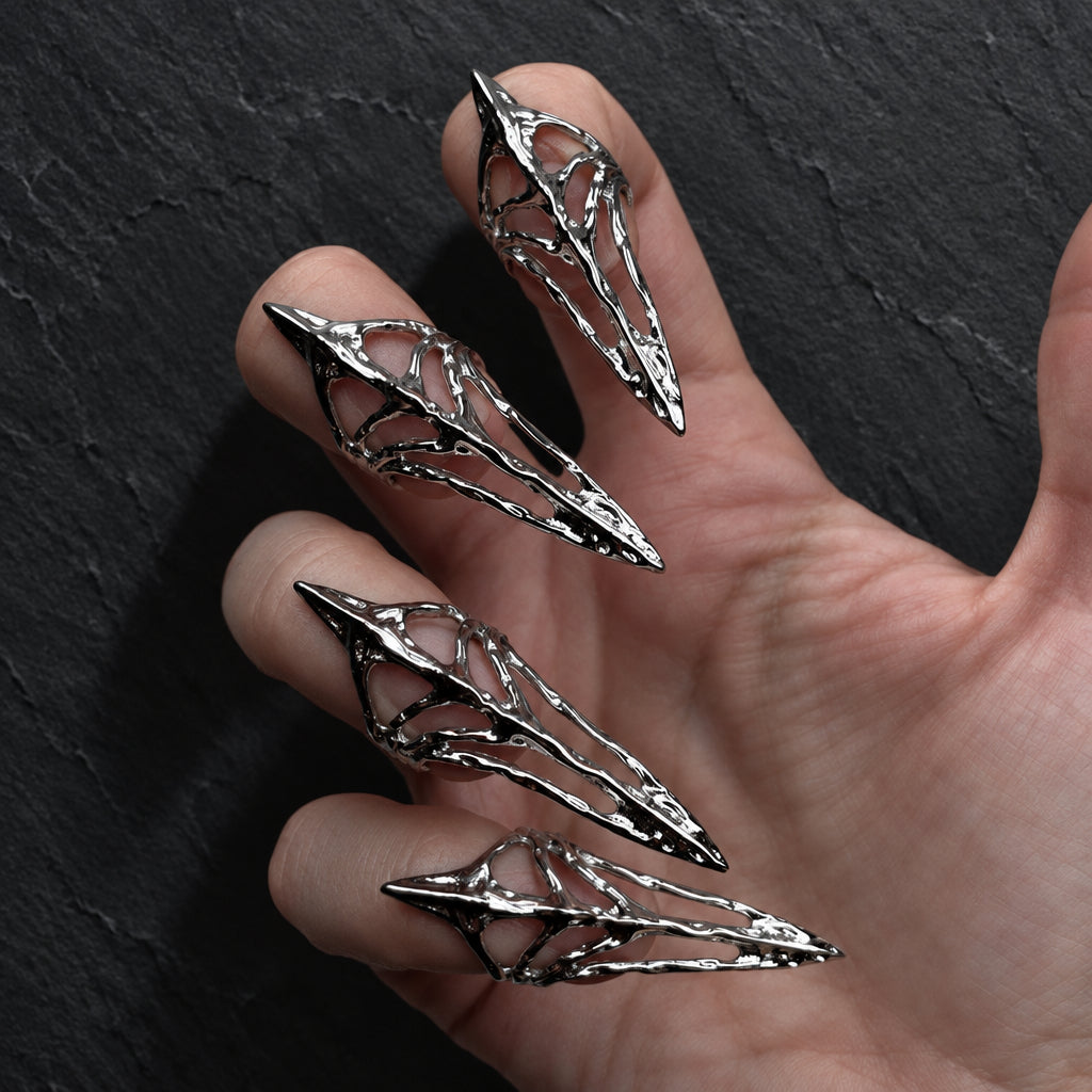 gothic claw ring, finger armor jewelry, silver nail ring, nail armor ring, punk hand jewelry, gothic fingertip ring, unisex gothic jewelry, dark avant garde jewelry, silver claw jewelry, alternative fashion ring, skeletal jewelry, rhinestone claw ring, Y2K gothic accessory, K-pop inspired jewelry, idol stage accessory, metal nail cover, gothic hand armor, cyber gothic accessory