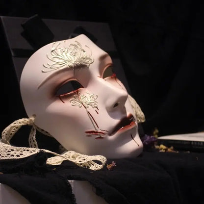 Manjusaka spider lily mask, Gothic blood tear face mask, Chinese inspired full face mask, red spider lily cosplay mask, porcelain Gothic mask, silver flower horror mask, dark fantasy masquerade mask, bloody tear mask cosplay, spider lily Halloween mask, pale full face costume mask, Gothic floral face mask, lace tie masquerade mask, unsettling porcelain mask, fantasy horror face covering