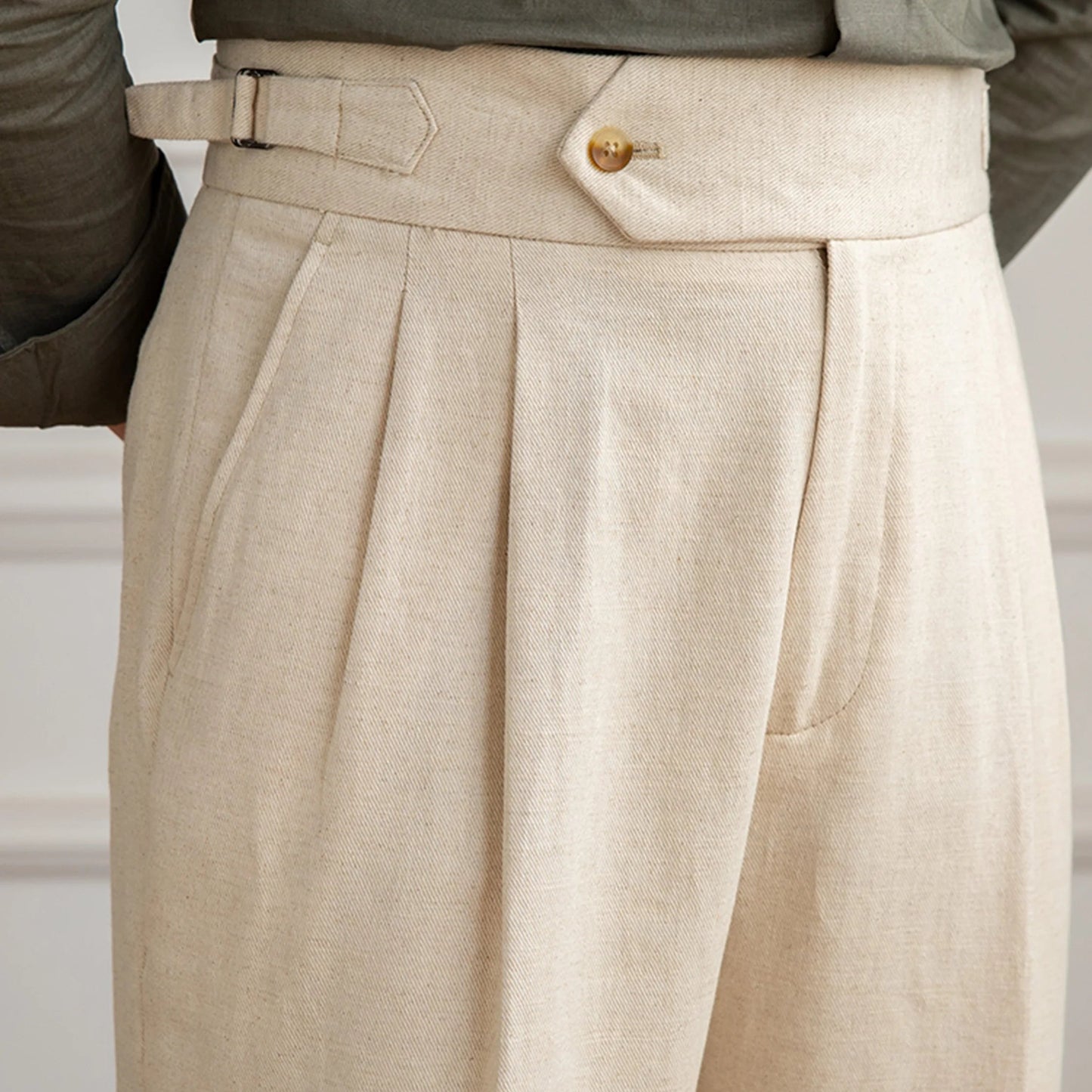 men's linen trousers, linen cotton trousers, pleated trousers, double pleated trousers, men's tapered trousers, tailored trousers, vintage trousers, vintage menswear, men's tailored pants, linen pants men, cotton linen pants, pleated pants men, tapered pants men, classic trousers, heritage menswear, romantic menswear, old world clothing, vintage inspired clothing, neutral trousers, beige trousers, cream trousers, men's dress trousers, smart casual trousers, extended waistband trousers, cuffed trousers